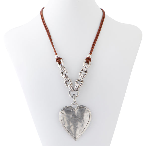 Large hand made hammered silver heart pendant with a leather and silver chain necklace.   Necklace measures 23
