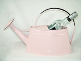 Pink enamel watering can, perfect as a wine holder or nice decorative piece in our garden.