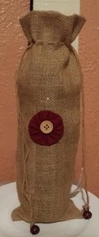 Burlap Wine Bag With A Burgundy and Tan Flower and Jute Pull Strings