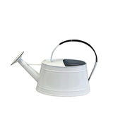 White Watering Can. Functional watering can and also makes an interesting wine holder. Add flowers for a pretty outdoor table setting.