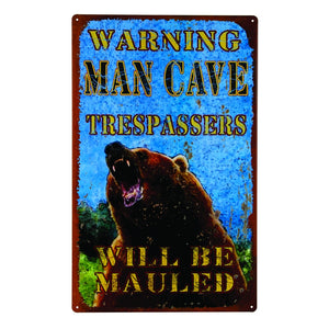 This tin sign is perfect for your cabin home or the man cave. The sign pictures a grizzly bear with the caption "Warning- Man Cave - Trespassers will be Mauled"