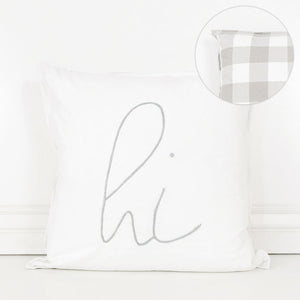 Soft gray and white "Hi" pillow with buffalo check backing.