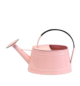 Pink enamel watering can, perfect as a wine holder or nice decorative piece in our garden.