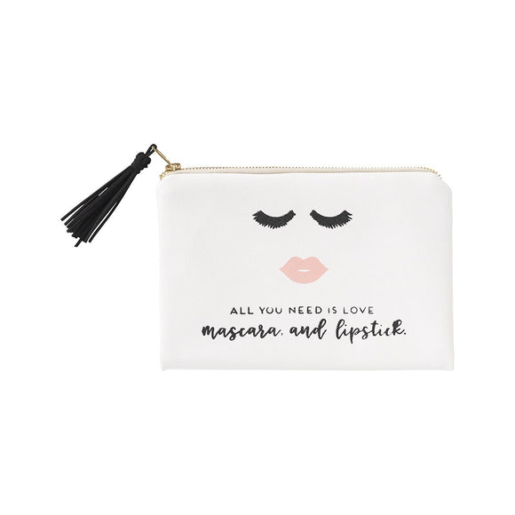 Adorable white cosmetic bag with black tassel zipper pull. Imprinted on the front are lashes + lips with the words 